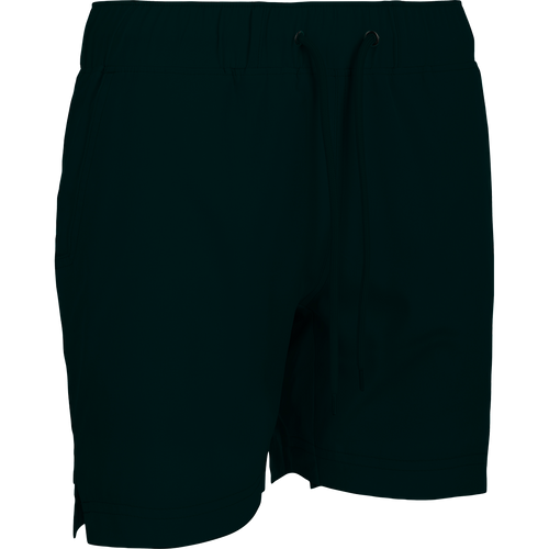 A versatile black shorts with a drawstring and built-in liner, perfect for the gym or beach. Features include 4-way stretch, quick-drying fabric, and moisture-wicking technology. Back and front pockets, scalloped hem, and a 7-inch inseam. From Purewhitelaneshop.