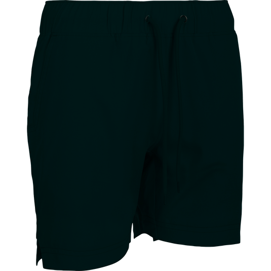 A versatile black shorts with a drawstring and built-in liner, perfect for the gym or beach. Features include 4-way stretch, quick-drying fabric, and moisture-wicking technology. Back and front pockets, scalloped hem, and a 7-inch inseam. From Purewhitelaneshop.