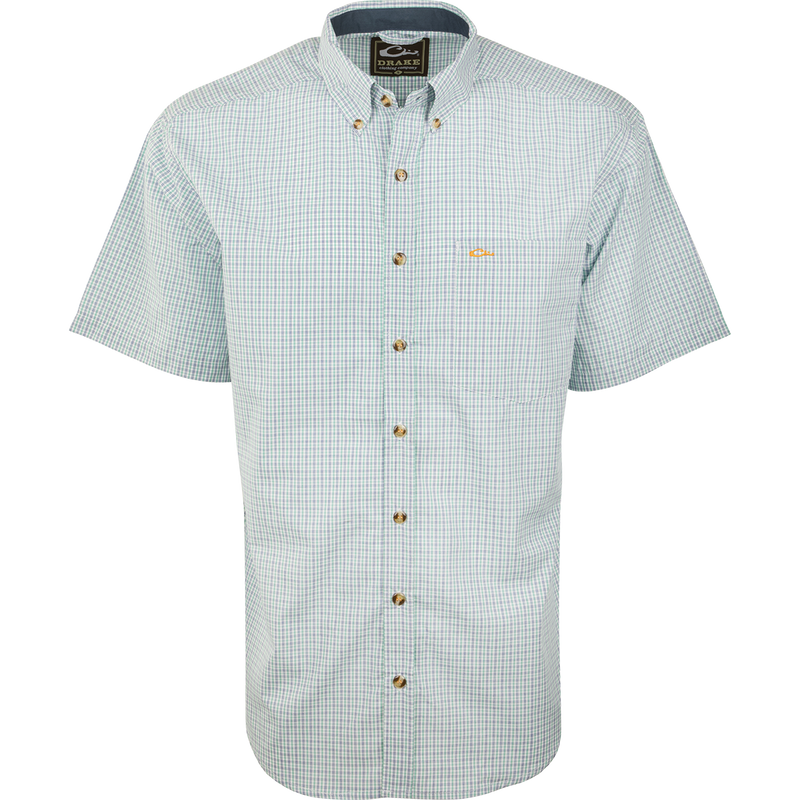 Close-up of the Big Easy Plaid Shirt S/S, featuring a button-down collar, sleeve detail, and chest pocket, made with quick-drying StayCool fabric.