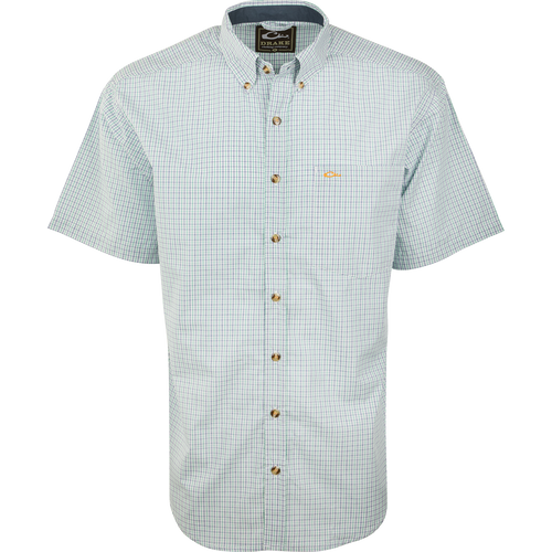 Close-up of the Big Easy Plaid Shirt S/S, featuring a button-down collar, sleeve detail, and chest pocket, made with quick-drying StayCool fabric.