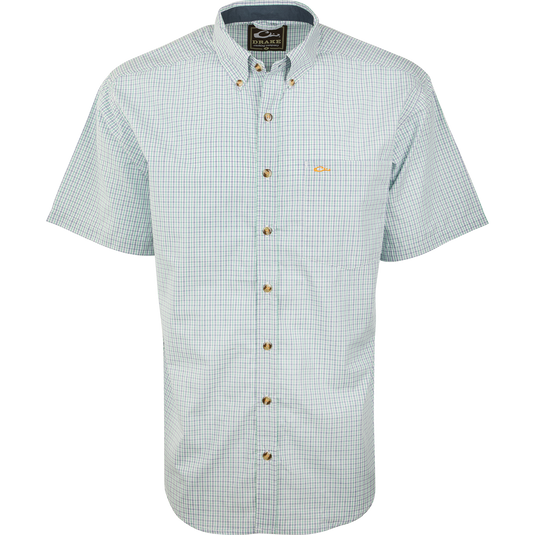 Close-up of the Big Easy Plaid Shirt S/S, featuring a button-down collar, sleeve detail, and chest pocket, made with quick-drying StayCool fabric.