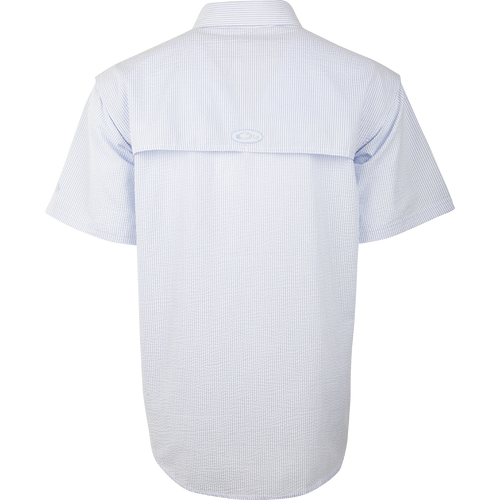 A Seersucker Wingshooter's Shirt with a button-down collar, heat vents, and multiple pockets. Made of StayCool™ fabric for breathability and wicking benefits. Perfect for spring and summer outings.
