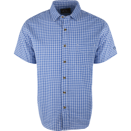 A blue and white plaid NeverTuck Shirt S/S made of soft-washed 100% cotton. Features include an open collar style and a left chest pocket. Perfect for looking and feeling your best. From Purewhitelaneshop, a store known for high-quality hunting gear and casual apparel.