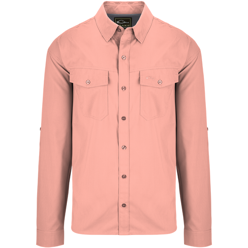 Traveler's Solid Dobby Shirt L/S: Classic fit shirt with hidden button-down collar, chest pockets, and split tail hem. Versatile for all seasons.