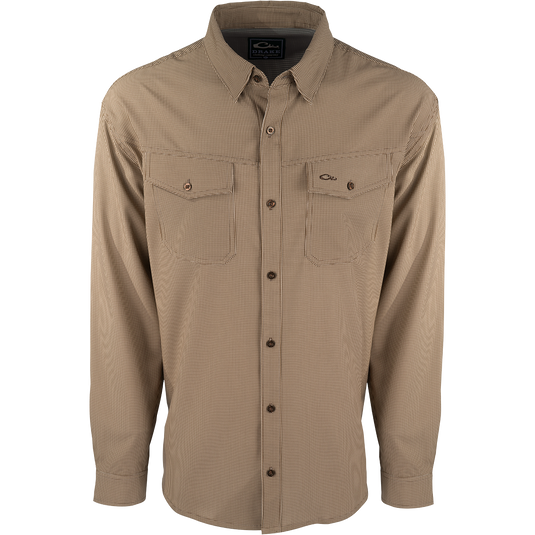 A lightweight, wrinkle-resistant Traveler's Check Shirt L/S with four-way stretch for freedom of movement. Moisture-wicking and breathable, perfect for the man on the go. Two chest pockets with button flaps.