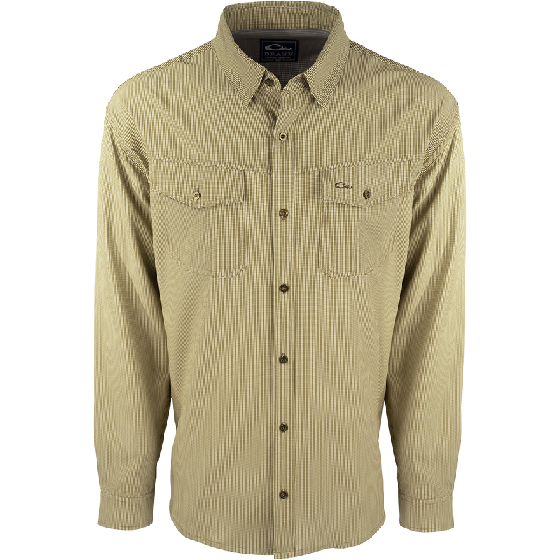 A lightweight, wrinkle-resistant Traveler's Check Shirt L/S with four-way stretch for freedom of movement. Moisture-wicking and breathable, perfect for the man on the go.