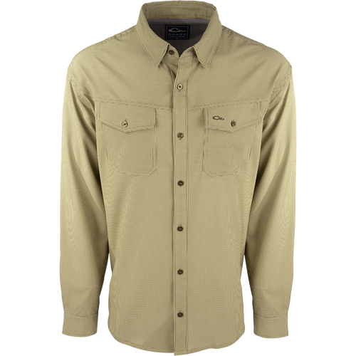 A lightweight, wrinkle-resistant Traveler's Check Shirt L/S with four-way stretch for freedom of movement. Moisture-wicking and breathable, perfect for the man on the go.