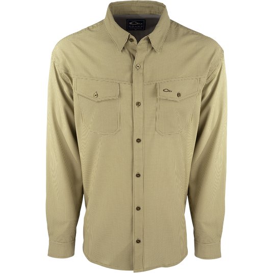 A lightweight, wrinkle-resistant Traveler's Check Shirt L/S with four-way stretch for freedom of movement. Moisture-wicking and breathable, perfect for the man on the go.