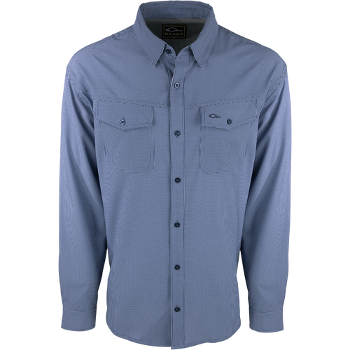 A lightweight, wrinkle-resistant Traveler's Check Shirt L/S with four-way stretch for freedom of movement. Moisture-wicking and breathable, perfect for the man on the go. Two chest pockets with button flaps.