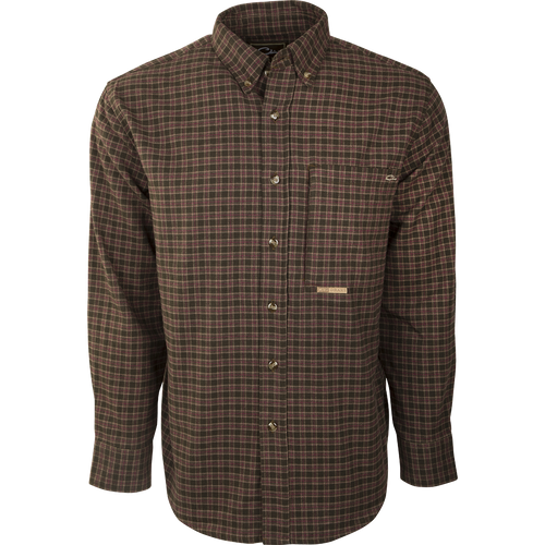 A close-up of the Autumn Brushed Twill Shirt, a long-sleeved button-up shirt made from 100% brushed cotton twill. It features a left chest pocket with a hidden zippered pocket behind and a button-down collar. Perfect for fall and winter outdoor activities or workdays.