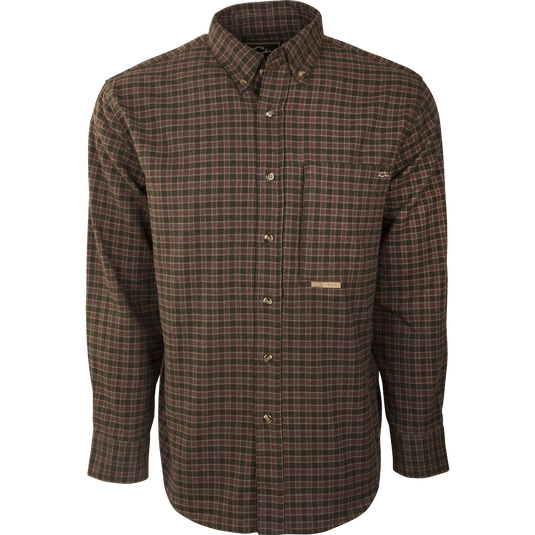 A close-up of the Autumn Brushed Twill Shirt, a long-sleeved button-up shirt made from 100% brushed cotton twill. It features a left chest pocket with a hidden zippered pocket behind and a button-down collar. Perfect for fall and winter outdoor activities or workdays.