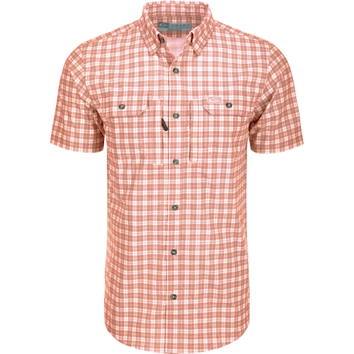 A red and white plaid shirt with hidden button-down collar, vented back cape, and two chest pockets. Lightweight and moisture-wicking for comfort.
