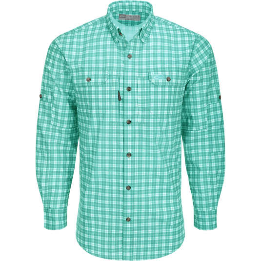Hunter Creek Check Plaid Shirt L/S: A lightweight, moisture-wicking shirt with micro-mesh for natural cooling. Features include UPF 30 sun protection, hidden button-down collar, and vented back cape. Two chest pockets with Magnattach and zipper closures. Sculpted hem with built-in sunglass wipe. Adjustable roll-up sleeves. High performance and functional for hunting and outdoor activities.