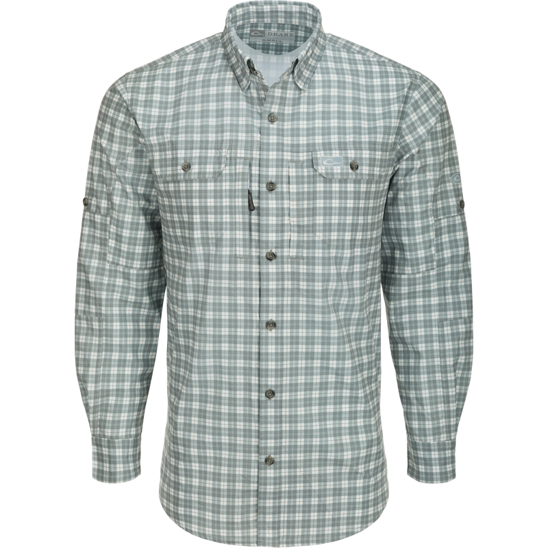 Hunter Creek Check Plaid Shirt L/S: A classic fit, long-sleeved shirt with hidden button-down collar, vented back cape, and button-through flap chest pockets. Lightweight, moisture-wicking, and UPF30 rated for sun protection.
