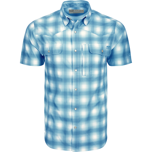 Cinco Ranch Western Plaid Shirt: A lightweight, moisture-wicking shirt with a hidden button-down collar, vented back, and two chest pockets with snap closures. Perfect for outdoor activities.