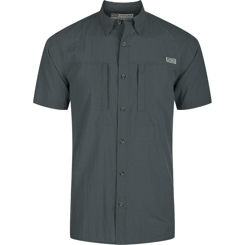 Classic Seersucker Minicheck Shirt: Close-up of a black shirt with a patch, button detail, and hidden zippered chest pocket.