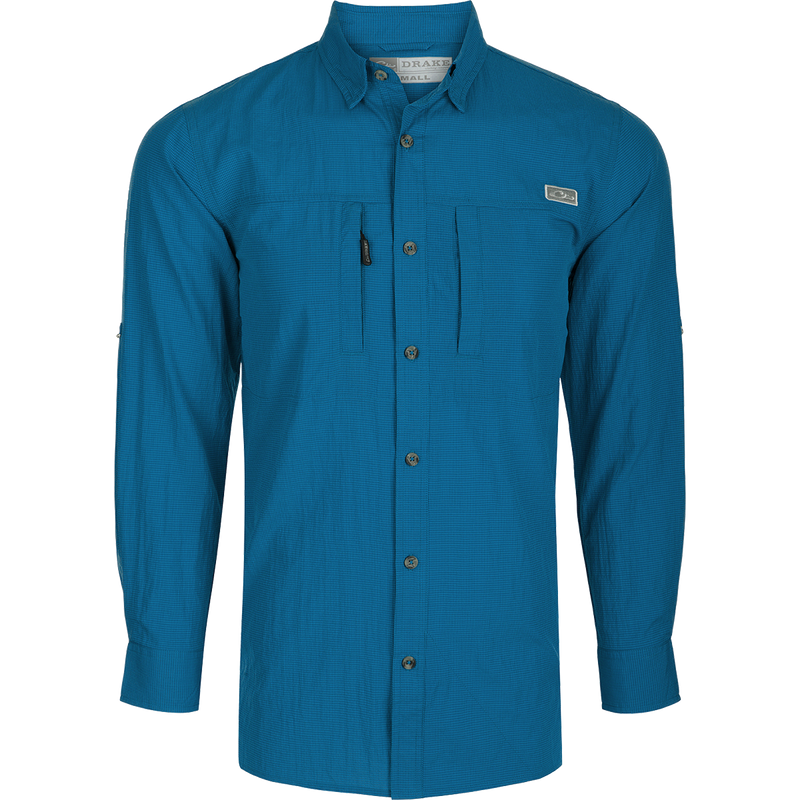 Classic Seersucker Minicheck Shirt L/S: A blue shirt with long sleeves, button-down collar, hidden zippered chest pocket, and Magnattach™ closure. Vented cape back and split tail hem for added ventilation and versatility.