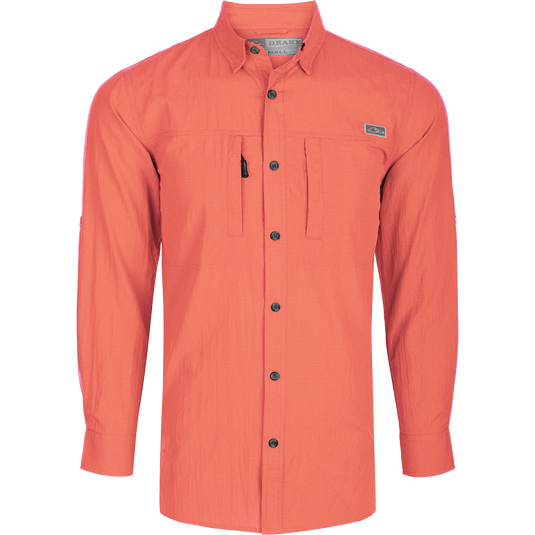 Classic Seersucker Minicheck Shirt L/S: A soft, featherweight shirt with a hidden button-down collar, zippered chest pocket, and magnet closure. Features UPF30 sun protection, moisture-wicking fabric, and a vented cape back for added ventilation. Perfect for hunting and outdoor activities.