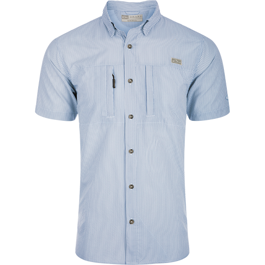 Classic Seersucker Stripe Shirt S/S: A button-down shirt with blue and white stripes, made from performance fabric for moisture-wicking and sun protection. Features include hidden zippered chest pocket, Magnattach™ closure, vented cape back, and split tail hem.