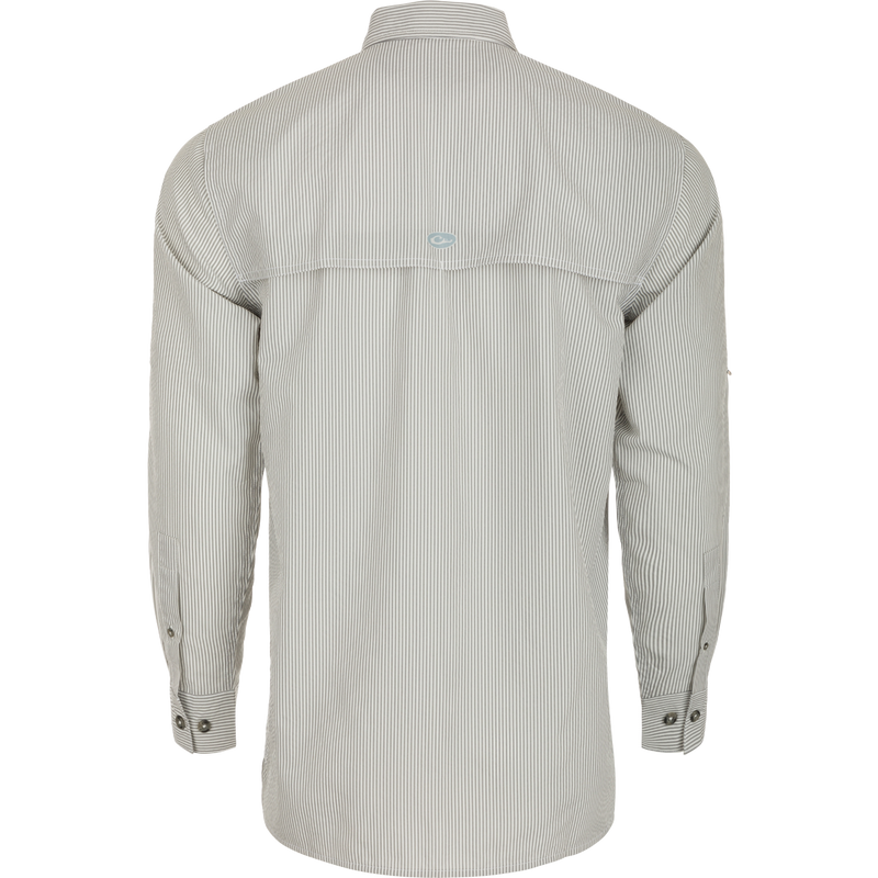 Close-up of the Drake Classic Seersucker Stripe Shirt, a soft and featherweight performance shirt with UPF30 sun protection, moisture-wicking fabric, and a hidden zippered chest pocket. Classic fit with a button-down collar and vented cape back. Perfect for hunting and outdoor activities.