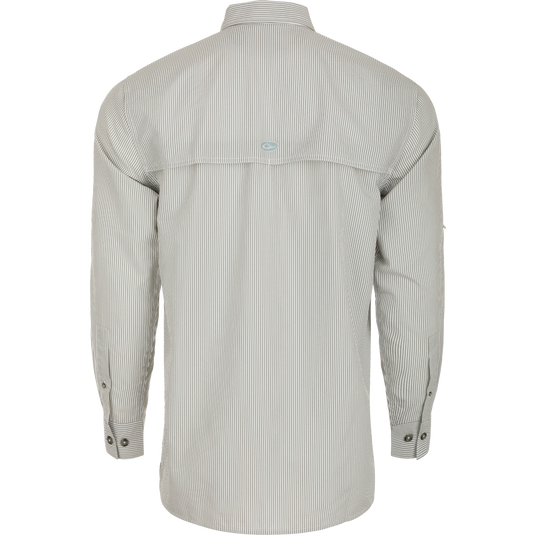 Close-up of the Drake Classic Seersucker Stripe Shirt, a soft and featherweight performance shirt with UPF30 sun protection, moisture-wicking fabric, and a hidden zippered chest pocket. Classic fit with a button-down collar and vented cape back. Perfect for hunting and outdoor activities.