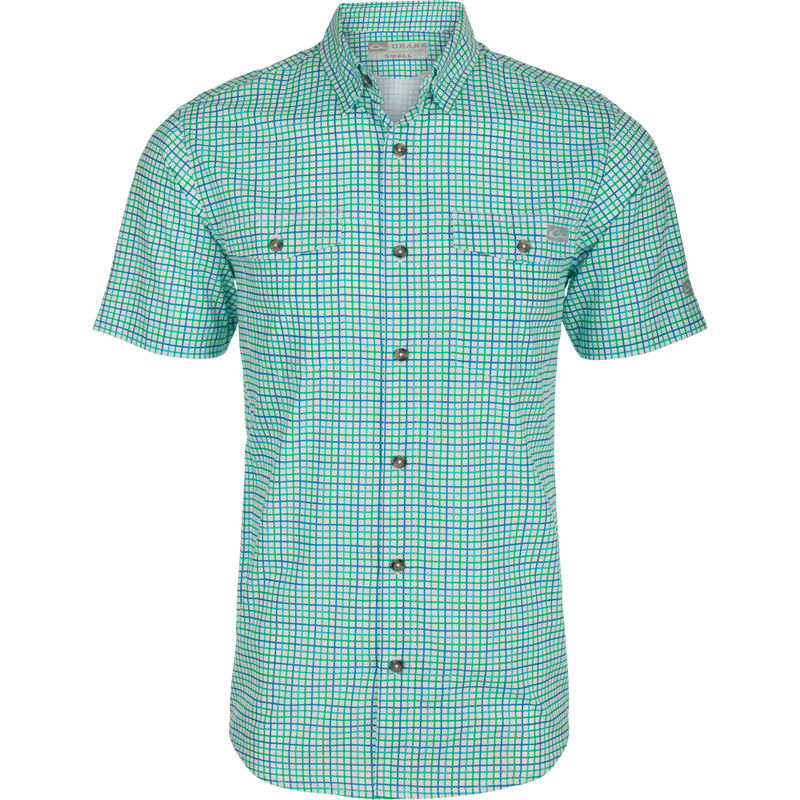 Frat Tattersall Shirt S/S: Lightweight, moisture-wicking shirt with UPF30 sun protection. Classic fit, hidden button-down collar, chest pockets, vented cape back, sculpted hem, and built-in sunglass wipe. Perfect for hunting, fishing, and outdoor activities.