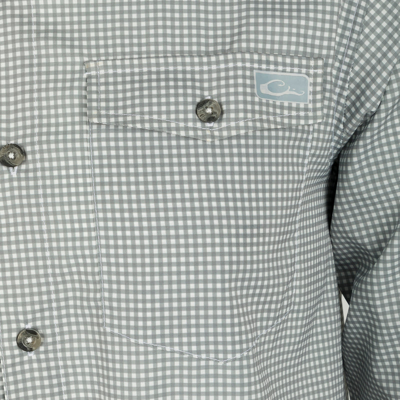Frat Gingham Check Shirt L/S - Close-up of lightweight, moisture-wicking shirt with hidden button-down collar, chest pockets, and vented cape back. Sculpted hem and adjustable roll-up sleeves.
