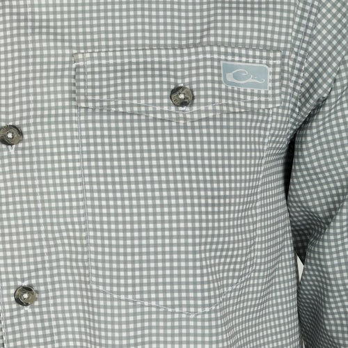 Frat Gingham Check Shirt L/S - Close-up of lightweight, moisture-wicking shirt with hidden button-down collar, chest pockets, and vented cape back. Sculpted hem and adjustable roll-up sleeves.