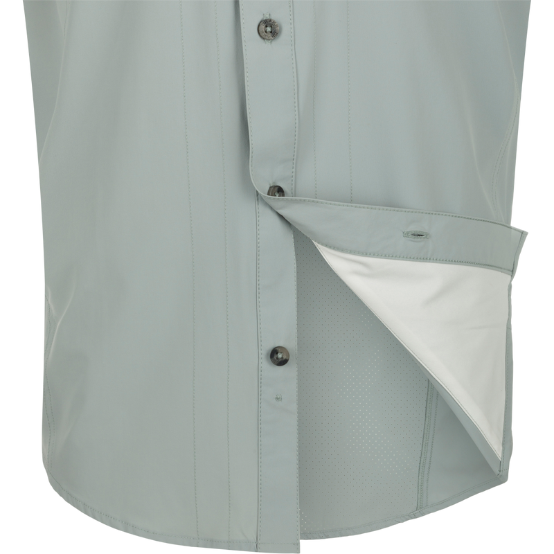 Quarry Wingshooter Trey Shirt S/S: Close-up of technical button-up shirt with hidden collar, vented back, and multiple pockets for outdoor performance.