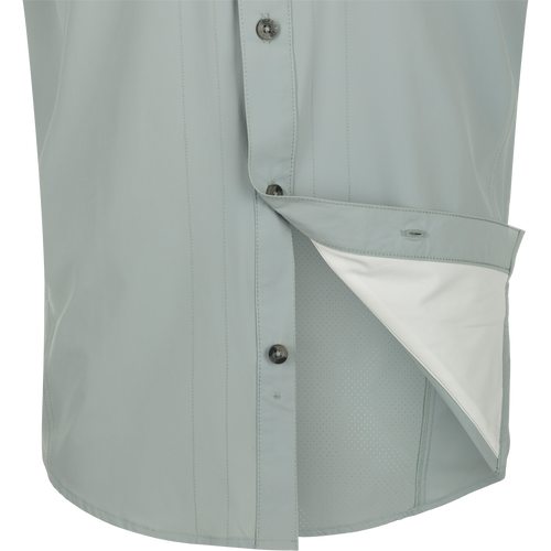 Quarry Wingshooter Trey Shirt S/S: Close-up of technical button-up shirt with hidden collar, vented back, and multiple pockets for outdoor performance.