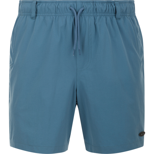 Dock Short 6" - blue durable, quick-drying nylon/spandex swim trunk shorts blend with water-resistant finish. Features elastic waist, drawstring, mesh pockets, and YKK zippered back pockets. Perfect for boat to dock transitions.