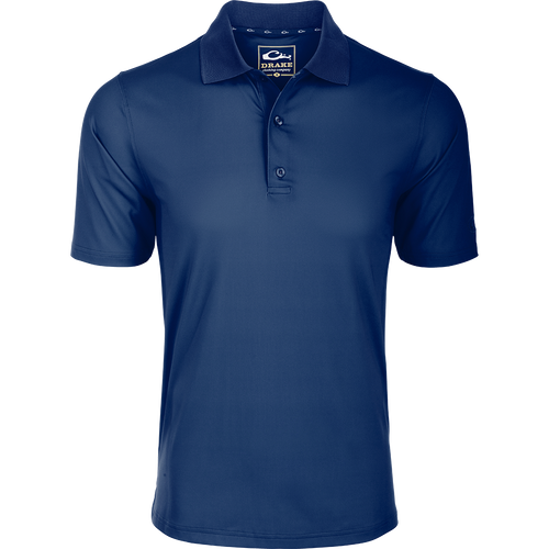 Performance Stretch Polo S/S: A close-up of the logo on a moisture-wicking, quick-drying blue shirt with open sleeves and a rib knit collar.