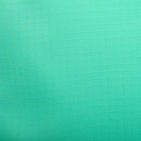 A close-up of the Flyweight Shirt with Vented Back L/S. Ultra-lightweight polyester construction for quick-drying and moisture-wicking. Sol-Shield™ UPF 50+ sun protection. Vented mesh back and horizontal chest pockets.