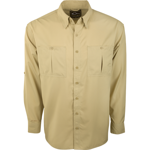 A close-up of the Flyweight Shirt with Vented Back L/S. Features include a logo, button, and pocket. Lightweight, breathable, and quick-drying. Perfect for warm-weather outdoor activities.