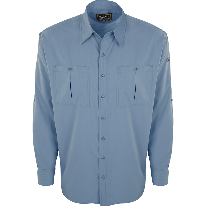 A close-up of the Flyweight Shirt with Vented Back L/S. Lightweight, breathable, and quick-drying. Features Sol-Shield™ UPF 50+ sun protection, vented mesh back, and chest pockets. Perfect for warm-weather outdoor activities.