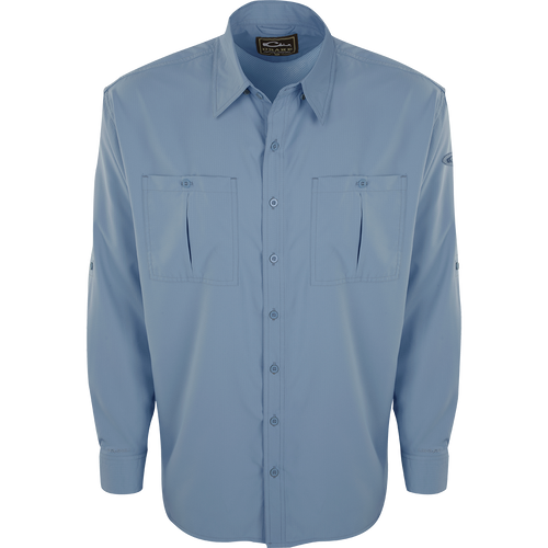 A close-up of the Flyweight Shirt with Vented Back L/S. Lightweight, breathable, and quick-drying. Features Sol-Shield™ UPF 50+ sun protection, vented mesh back, and chest pockets. Perfect for warm-weather outdoor activities.