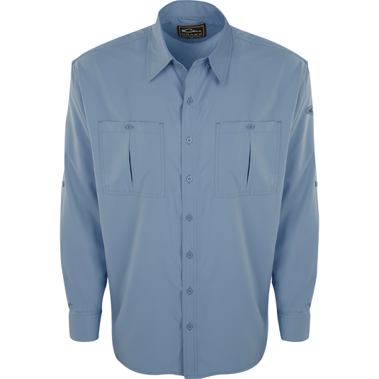 A close-up of the Flyweight Shirt with Vented Back L/S. Lightweight, breathable, and quick-drying. Features Sol-Shield™ UPF 50+ sun protection, vented mesh back, and chest pockets. Perfect for warm-weather outdoor activities.