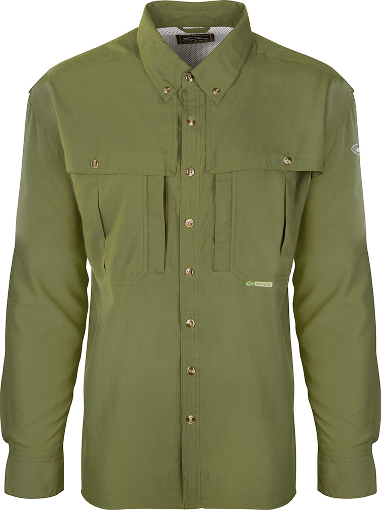 A close-up of the Youth Flyweight Wingshooter's Shirt, a green shirt with buttons. Lightweight, quick-drying, and easy to clean, this comfortable and stylish shirt is perfect for active kids at school, play, and in the outdoors. Made with 100% Polyester twill fabric and featuring a Magnattach™ left chest pocket, front and back heat vents, a sun blocker extension collar, and more. Ideal for waterfowl family adventures.