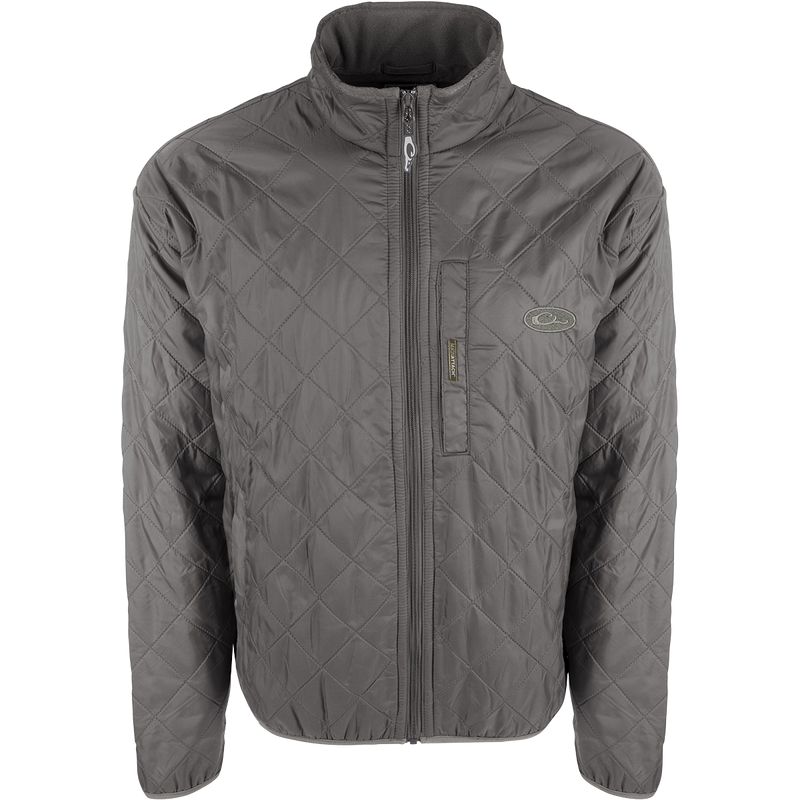 A Delta Fleece-Lined Quilted Jacket with quilted insulation and micro-fleece lining. Features Magnattach™ pocket and slash pockets with fleece lining.