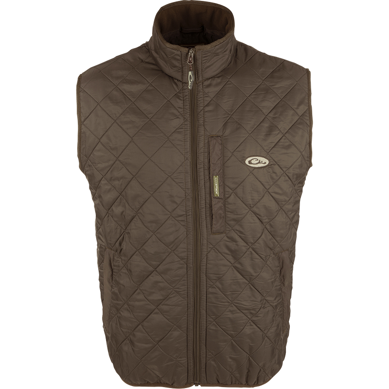 Delta Quilted Fleece Lined Vest: A stylish outerwear with a quilted design and micro-fleece lining for enhanced warmth. Features a Magnattach™ pocket on the left chest and two lower slash pockets with fleece linings. 
