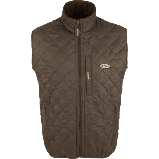 Delta Quilted Fleece Lined Vest: A stylish outerwear with a quilted design and micro-fleece lining for enhanced warmth. Features a Magnattach™ pocket on the left chest and two lower slash pockets with fleece linings. 