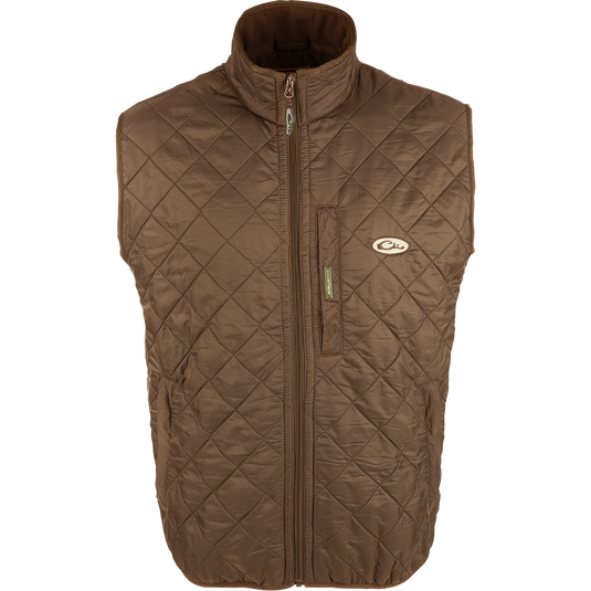 Delta Quilted Fleece Lined Vest: A quilted jacket with micro-fleece lining for enhanced warmth. Features a Magnattach™ pocket and lower slash pockets with fleece linings. 