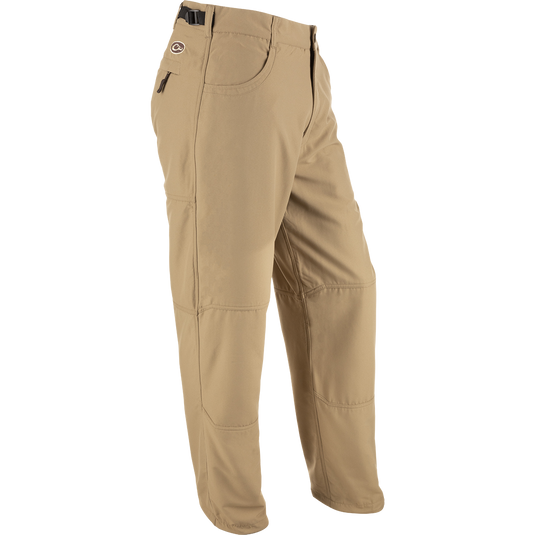 MST Jean Cut Wader Pant: Tan pants with adjustable waist and ankle, front slash pockets, and zippered rear pocket. Water-resistant and windproof Refuge HS™ fabric with 280g micro-fleece lining. Ideal for hunting and fishing.