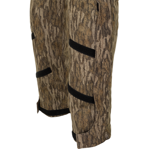 MST Ultimate Wader Bib: Camouflage shorts with Sherpa-lined pockets and zippered security pockets. Four-way stretch for easy movement.