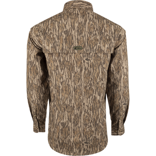 A lightweight, long-sleeved shirt with a tree pattern. Designed for breathability during hunts or at the shooting range. Features vents, mesh, and button tabs on sleeves. From Purewhitelaneshop.