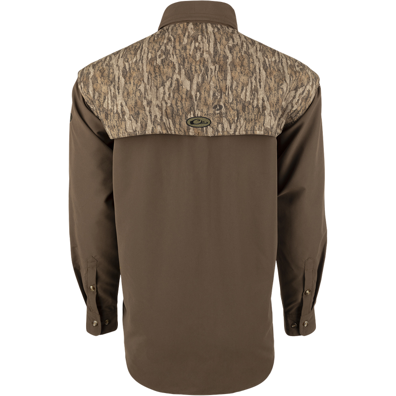 A lightweight, breathable Wingshooter's Shirt with a camouflage design. Features vents, mesh lining, and button tabs on sleeves for comfort and style. Perfect for hunting and shooting activities.