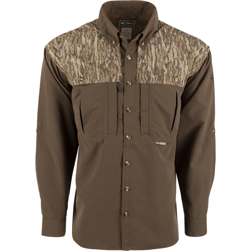 A lightweight, breathable Wingshooter's Shirt with a camouflage design. Features include vents, mesh lining, and button tabs on sleeves. Perfect for hunting and shooting activities.