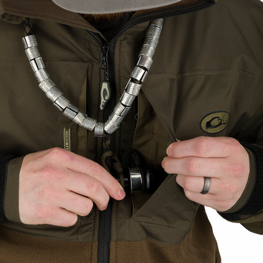 A person wearing the MST Guardian Eqwader Flex Fleece Full Zip Jacket, featuring a pocket close-up.