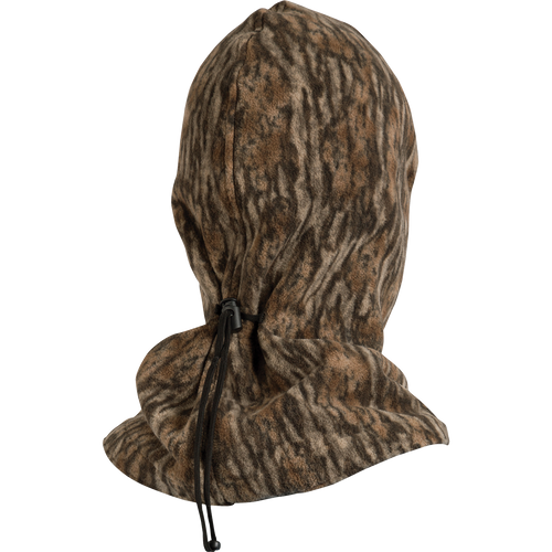 MST Face Mask: A midweight fleece mask with a hood, black strap, and zipper. Tailored eye and mouth openings for breathability and visibility. Adjustable back cinch for a secure fit. Ideal for cooler temperatures and outdoor activities.