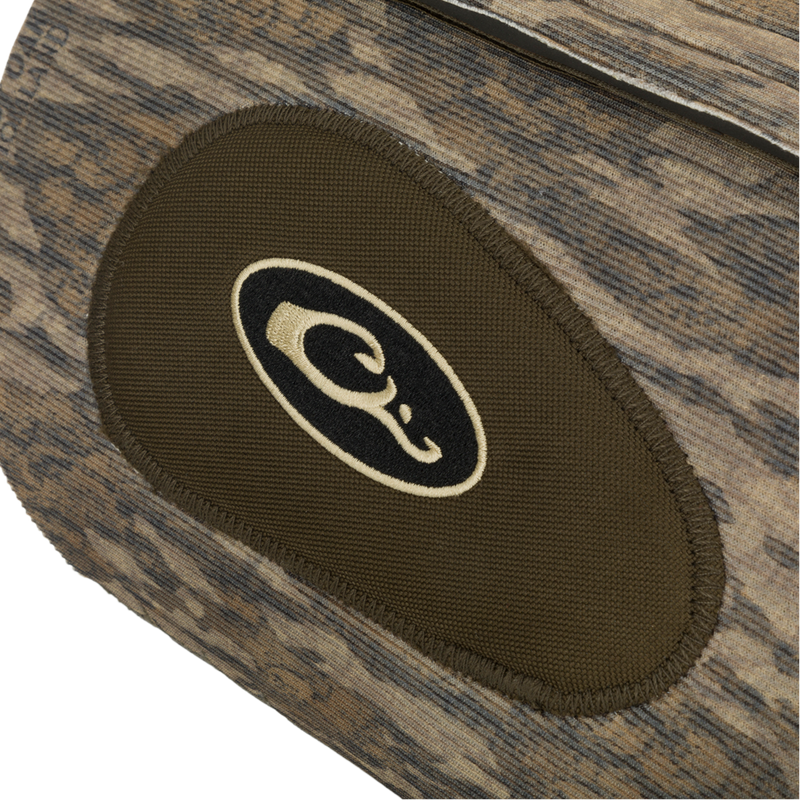 Close-up of the Drake Neoprene Dog Vest, showcasing the reinforced protection areas and a black and white logo for added durability and comfort.